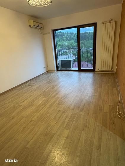 Apartament cu 2 camere decomandat în Podu Roș