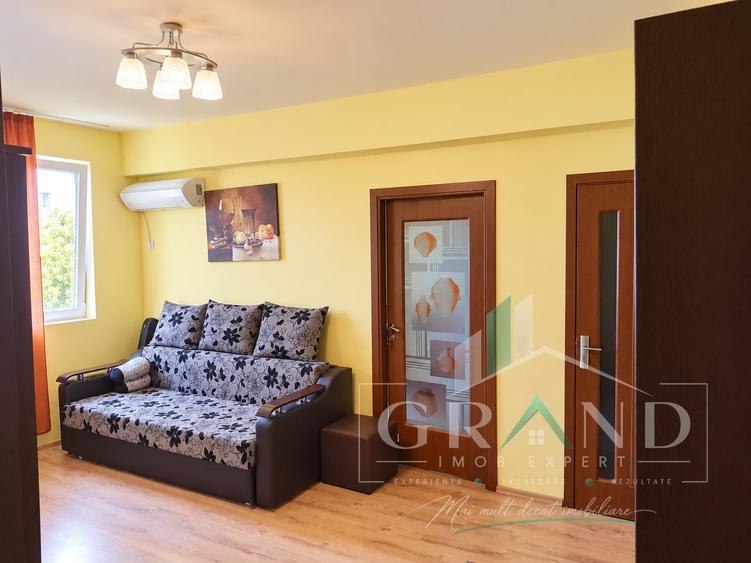 Apartament cu 2 camere semidecomandat, mobilat în Central