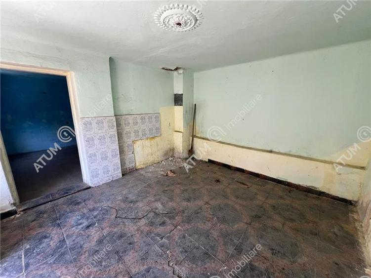 Casă individuală cu 5 camere cu Teren 489 Mp în Central