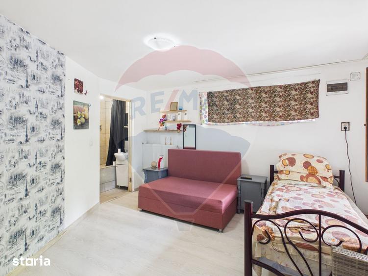 Casă cu 9 camere cu Teren 341 Mp în Dâmbovicioara