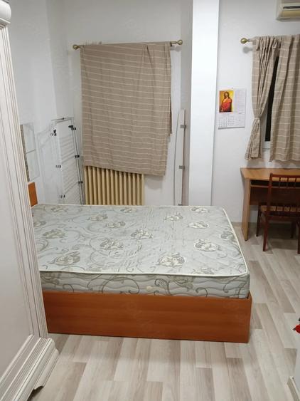 Garsonieră decomandată în Romană