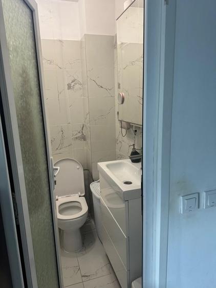 Apartament cu 3 camere semidecomandat în Ozana