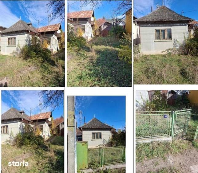 Casă cu 2 camere cu Teren 2000 Mp în Central