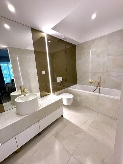 Apartament cu 3 camere semidecomandat, mobilat în Central
