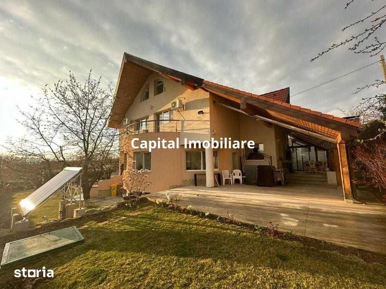 Casă cu 7 camere cu Teren 1200 Mp în Tomești