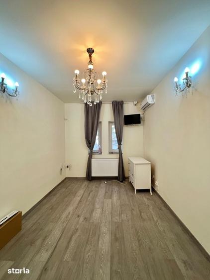 Apartament cu 5 camere în Romană