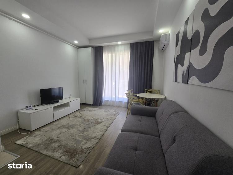 COSMOPOLIS - Apartament cu 2 camere si gradina, mobilat si utilat. - 2