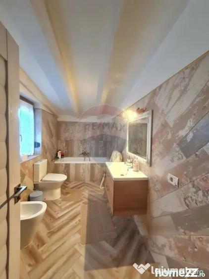 Casă cu 4 camere cu Teren 1165 Mp în Gologanu