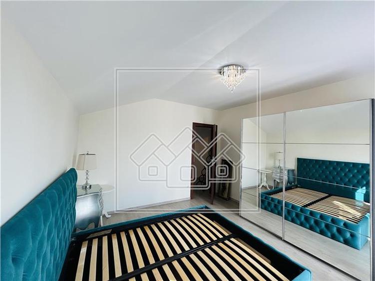 Ap pe 2 niveluri, 75 mp utili + 2 balcoane, mobilat modern - 15