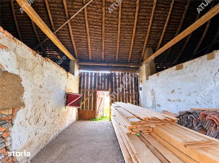 Casă cu 4 camere decomandat cu Teren 1650 Mp în Porumbacu de Jos