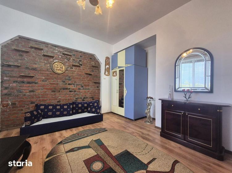 Apartament cu 2 camere decomandat în Tractorul