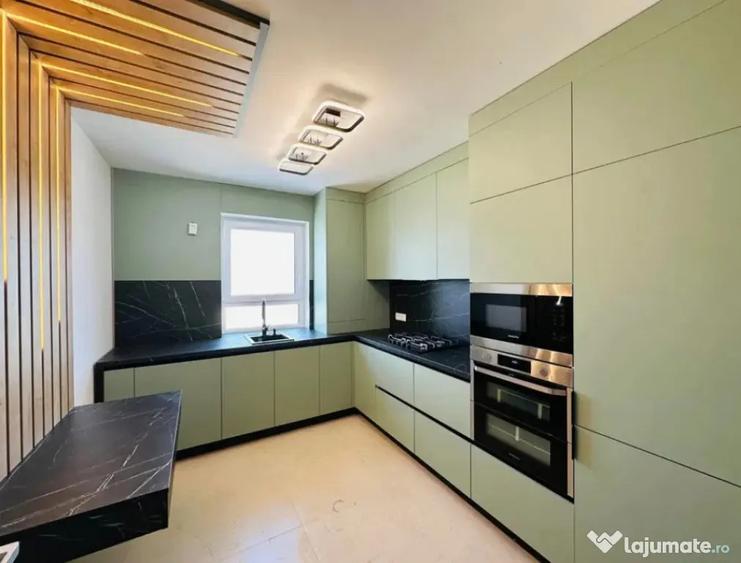 Apartament cu 3 camere decomandat în Tractorul