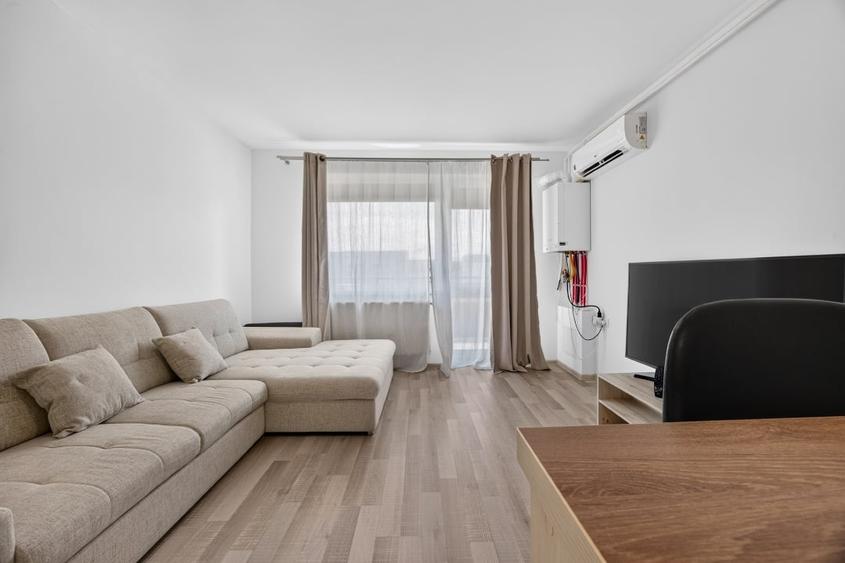 Apartament cu 2 camere semidecomandat, mobilat în Tractorul