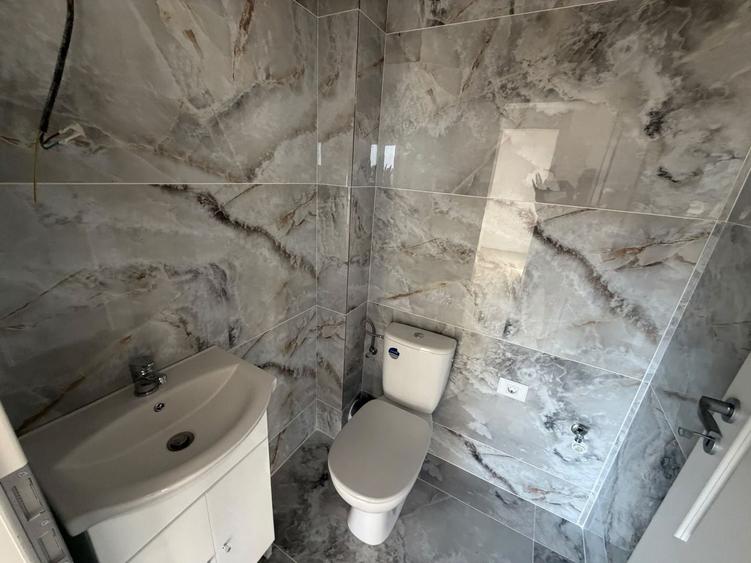 Apartament cu 3 camere decomandat în Dobroești