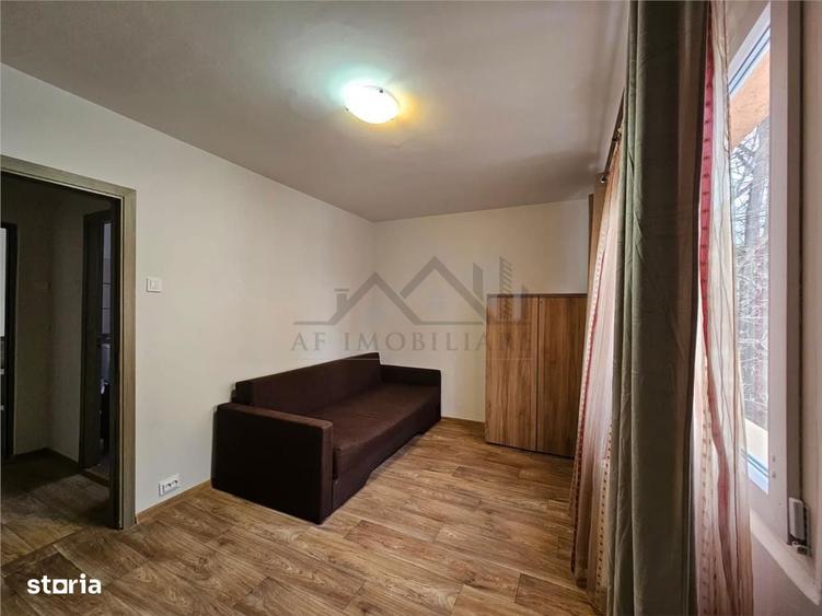 Apartament cu 2 camere semidecomandat, mobilat în Podu Roș