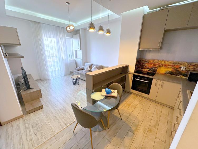 Apartament cu 2 camere semidecomandat, mobilat în Central