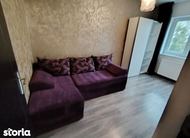 Apartament cu 3 camere semidecomandat în Podu Roș