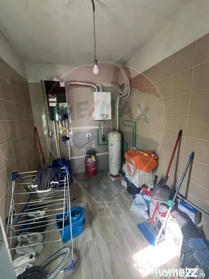 Casă cu 4 camere cu Teren 300 Mp în Central
