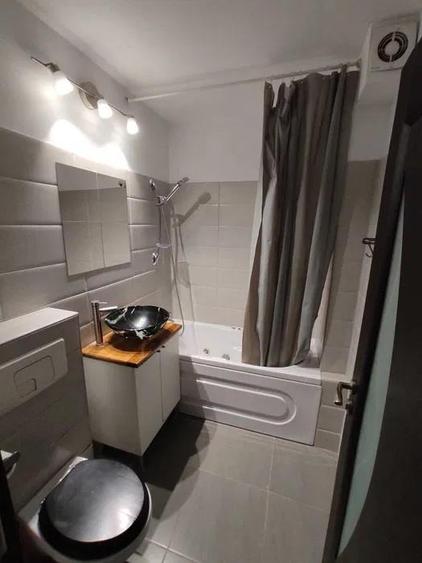 Apartament cu 2 camere semidecomandat, mobilat în Costin Georgian