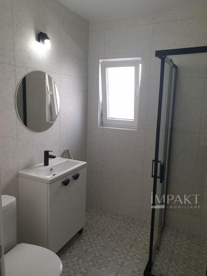 Apartament cu 2 camere semidecomandat, mobilat în Baciu
