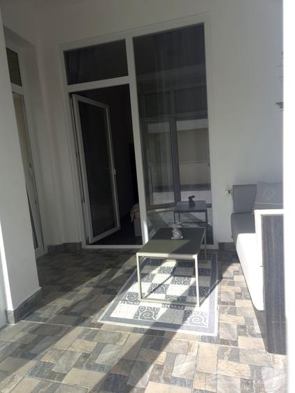 Apartament cu 2 camere semidecomandat, mobilat în Central