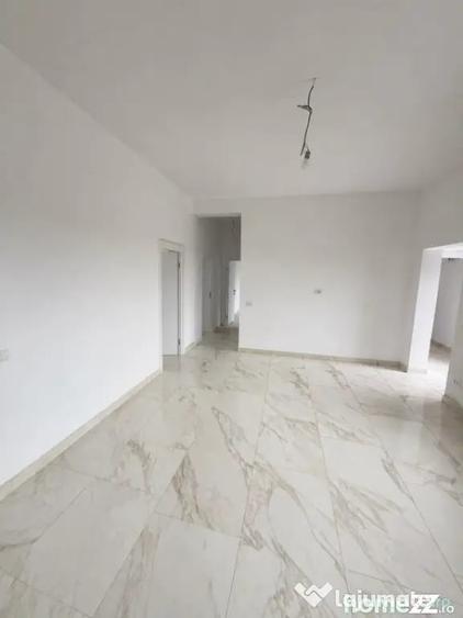 Casă cu 4 camere cu Teren 398 Mp în Cumpăna
