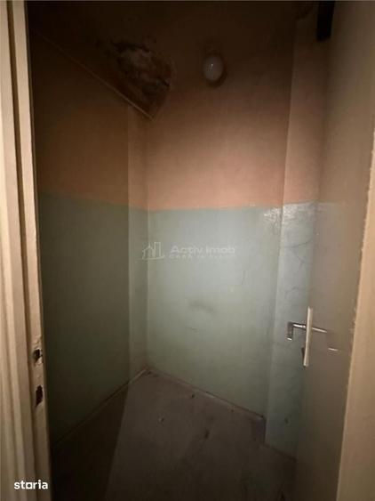 Apartament cu 3 camere semidecomandat în Central