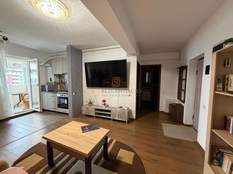 Apartament cu 2 camere semidecomandat, mobilat în Central