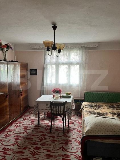 Casă individuală cu 2 camere cu Teren 714 Mp în Siret