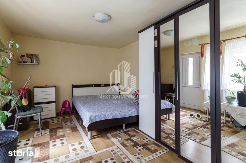 Casă cu 5 camere cu Teren 256.92 Mp în Coiciu