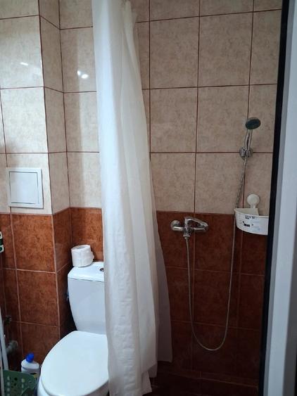 Garsonieră decomandată în Titan