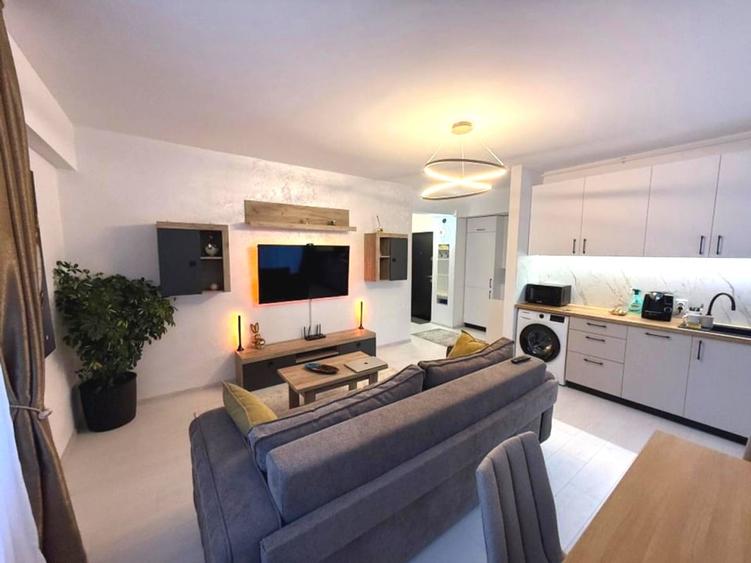 Apartament cu 3 camere semidecomandat, mobilat în Otopeni