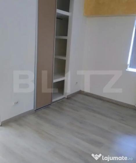 Apartament cu 4 camere semidecomandat în Central