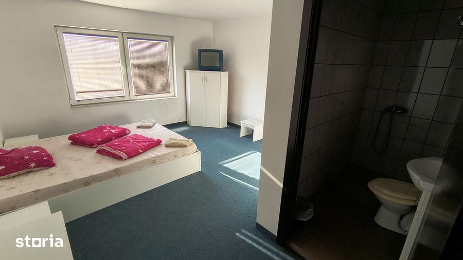 Casă cu 10 camere cu Teren 300 Mp în Sânmartin