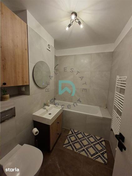 Apartament cu 3 camere decomandat, mobilat în Tractorul