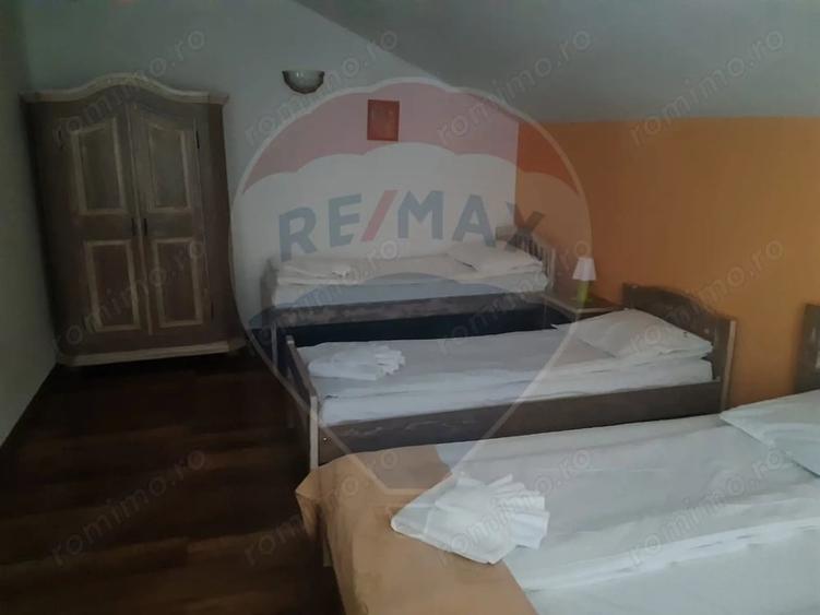 Casă cu 18 camere cu Teren 2880 Mp în Moieciu