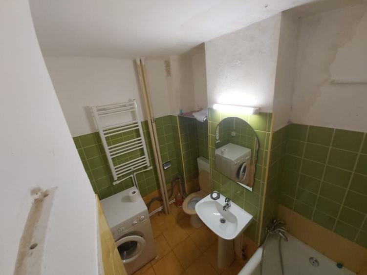 Garsonieră decomandată în ITM