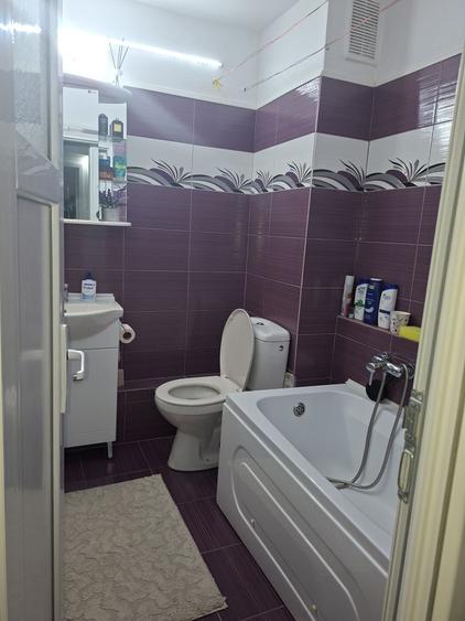 Apartament cu 4 camere decomandat în Moinești