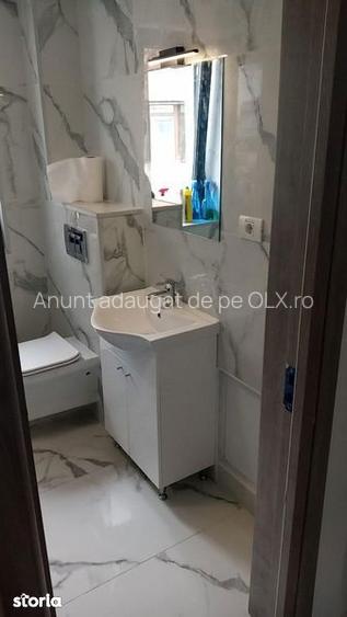 Casă cu 4 camere cu Teren 100 Mp în Vitan