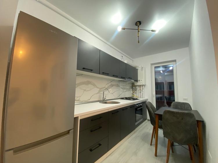 Apartament cu 3 camere semidecomandat, mobilat în Berceni — fotografia 3