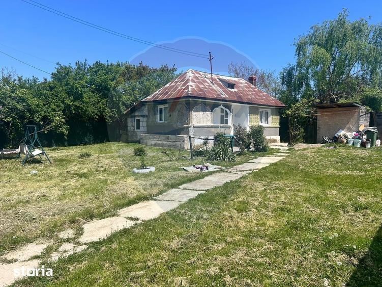 Casă cu 4 camere cu Teren 1071 Mp în Dumbrăvești