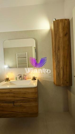 Apartament cu 2 camere semidecomandat, mobilat în Central