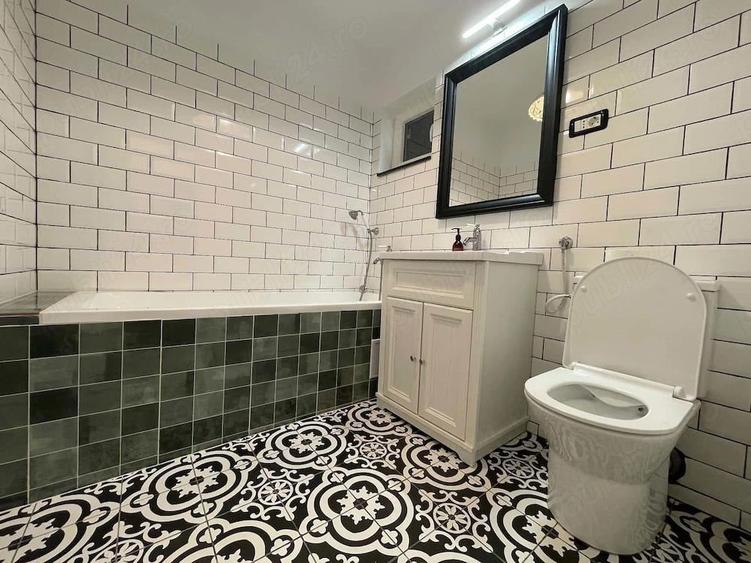 Apartament cu 3 camere semidecomandat în Dorobanți