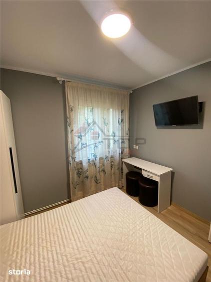 Apartament cu 2 camere semidecomandat în Podu Roș