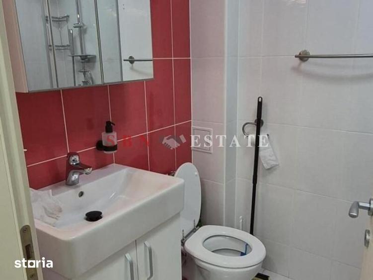 Garsonieră decomandată în Titan