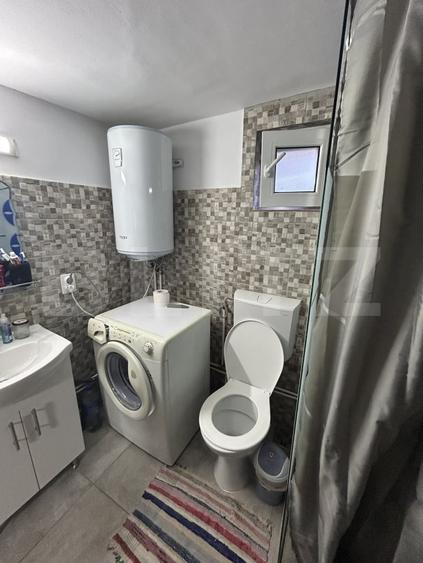 Casă individuală cu 2 camere cu Teren 1000 Mp în Bunești