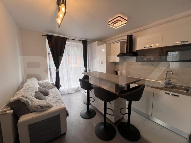 Apartament cu 3 camere semidecomandat, mobilat în Chinteni