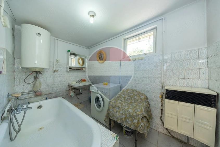 Casă cu Teren 1900 Mp în Central