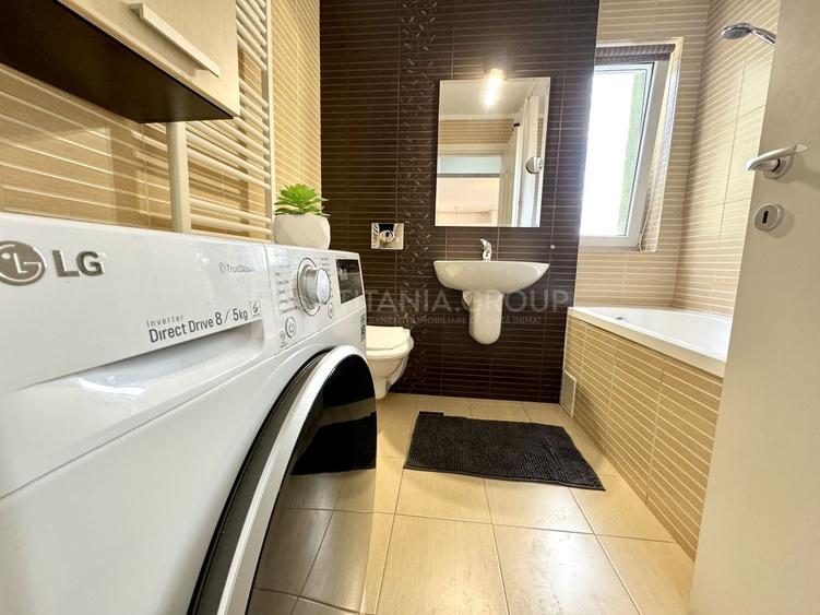 Apartament cu 2 camere semidecomandat, mobilat în Tractorul
