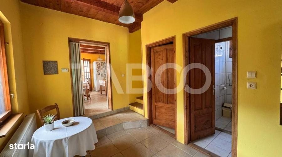 Casa de vanzare 6 camere loc de relaxare garaj teren 669 mp Cornatel - 18